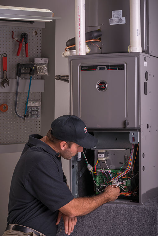 Man repairing furnace